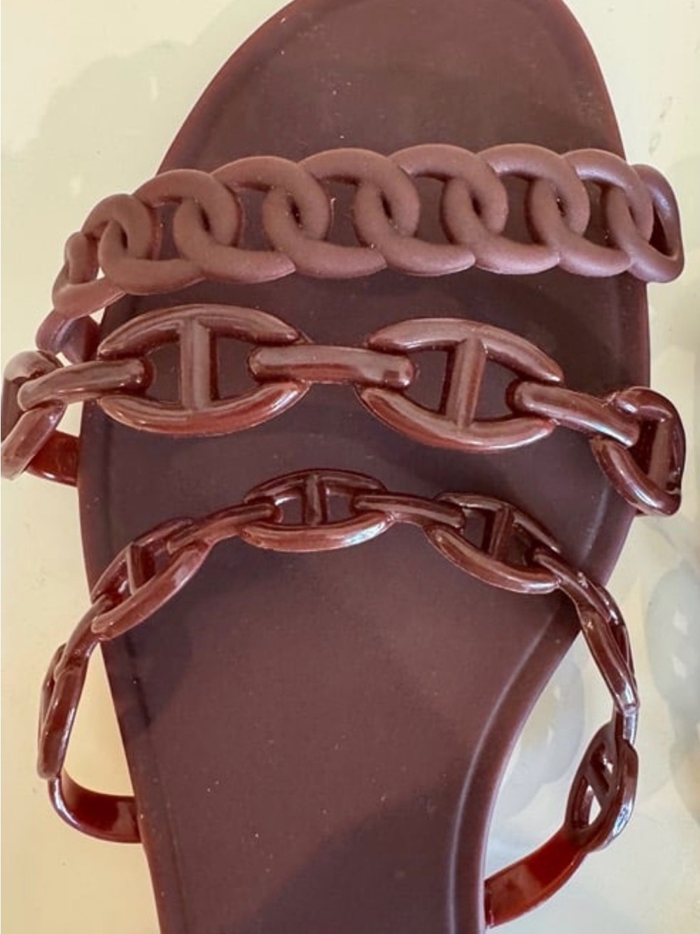 Women’s Brown Chain-Strap Slide Sandals - Cherry-colored rubber slippers.